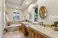40 _ 24 Cosso Court _ Tiled vanity with dual sinks and built-in bathtub
