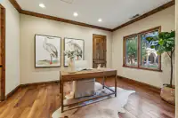 53 _ 24 Cosso Court _ Office with wooden desk, large windows, and hardwood flooring