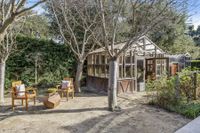 Greenhouse and two chairs